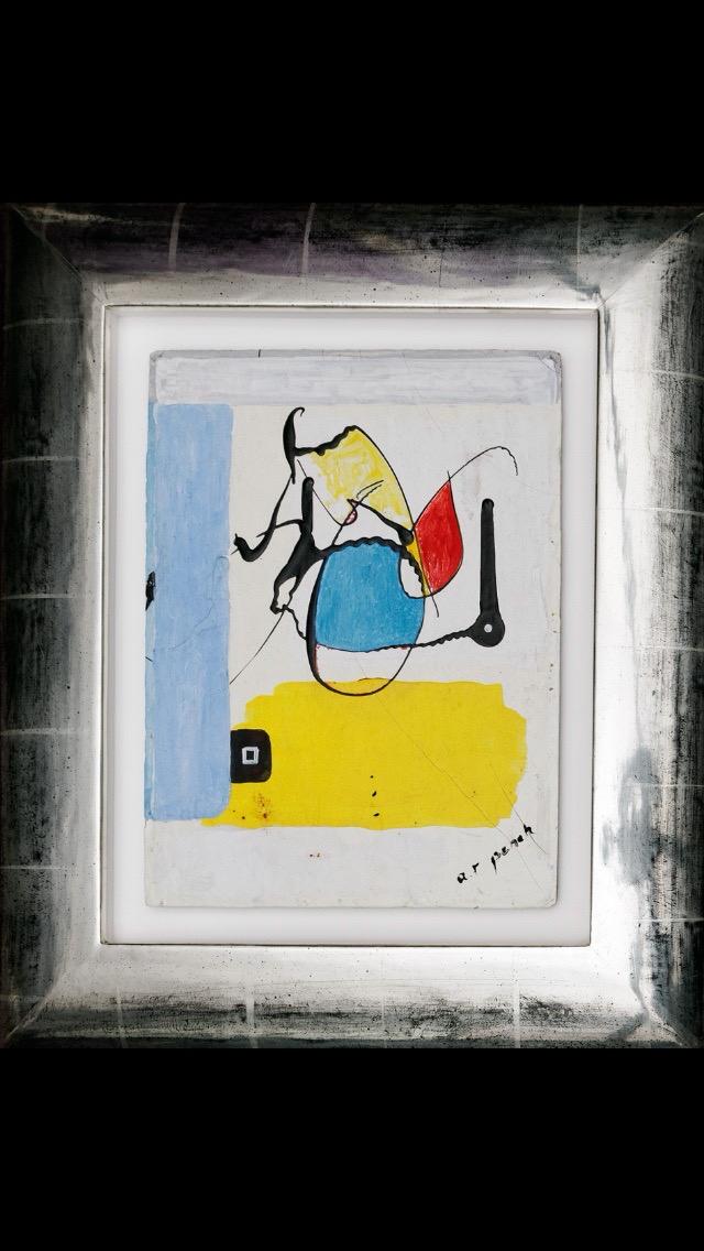 Framed abstract artwork with yellow, blue and red areas of colour, black lines and the signature “A. R. Penck.”